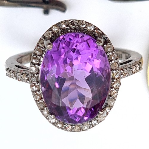 603 - Star lot : A beautiful suite of Amethyst and Diamond jewellery, which includes three stunningly larg... 