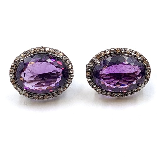 603 - Star lot : A beautiful suite of Amethyst and Diamond jewellery, which includes three stunningly larg... 