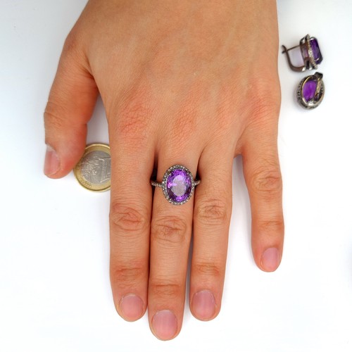 603 - Star lot : A beautiful suite of Amethyst and Diamond jewellery, which includes three stunningly larg... 