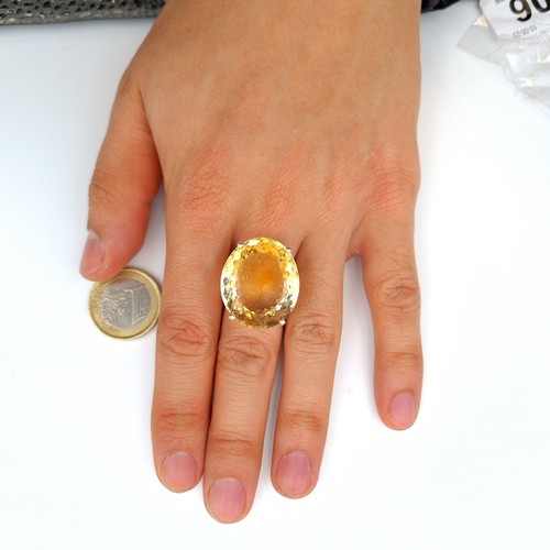 606 - A fabulous and huge natural Citrine cocktail ring, featuring a beautiful central facet cut 8 carat C... 