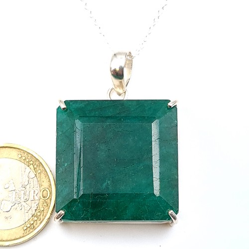 610 - Star Lot : A very exciting natural 100 carat Emerald necklace, this Emerald is a staggering size and... 