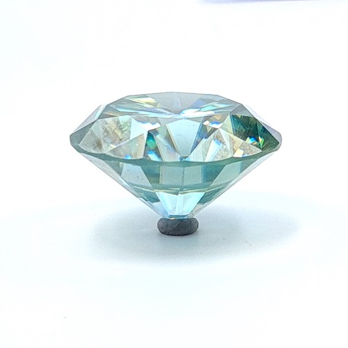 611 - A certified Ocean Blue Moissanite rare brilliant cut stone, of 29.76 carats. An excellent stone, whi... 