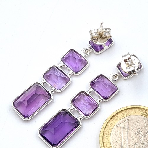 615 - A lovely pair of Amethyst three stone sterling silver drop pendant earrings, set with sterling silve... 