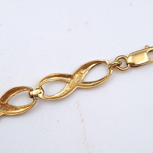 618 - A beautiful 9 carat gold bi-colour twist bracelet, set with attractive gem stone detail. Stamped 375... 