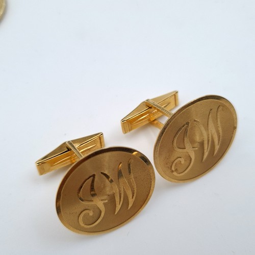 647 - Star Lot : A very fine pair of 14 carat gold vintage bar cuff links, stamped 14K. Initialled 