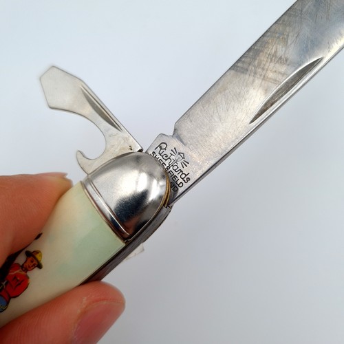 640 - A collection of three items, consisting of a three piece pen knife, set with nicely enamelled exteri... 