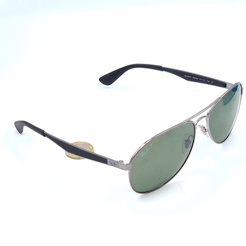 636 - A nice pair of designer aviator Ray-Ban's, set with black metal stems. Lenses in good condition. Enc... 