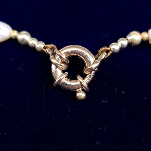 633 - A very attractive and unusual vintage choker style fresh water pearl necklace, set with a generous a... 