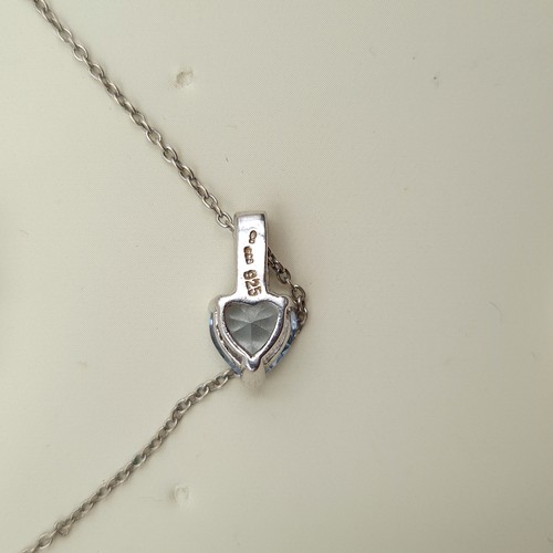 631 - A very pretty Fields heart shaped aqua marine  sterling silver pendant necklace and chain. Encased i... 