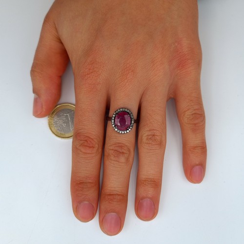 629 - A stunning certified natural Ruby and Diamond sterling silver ring, of a central 4.50 carat central ... 