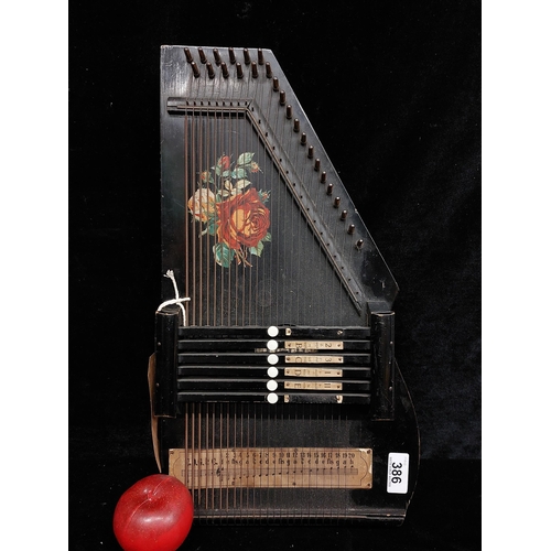 386 - A fantastic antique German Zither made by Auto-Harp. With lacquered wood body and all strings still ... 