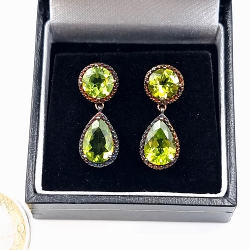 563 - A pair of Victorian Diopside drop pendant stud earrings. Set with generous tear drop drop stones.