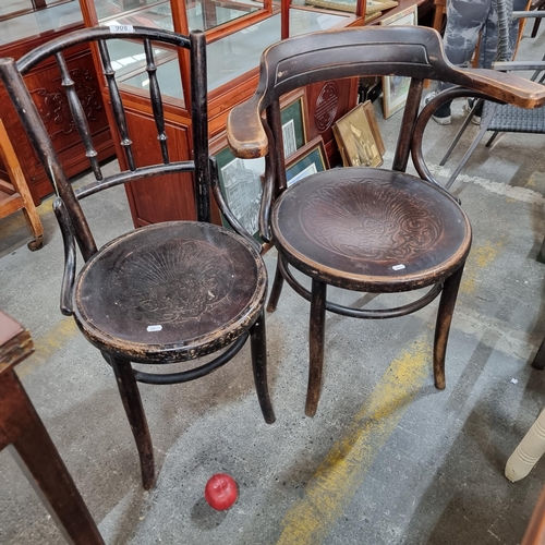 908 - A classic pair of vintage bentwood bistro chairs. Very characterful pieces, with one example boastin... 