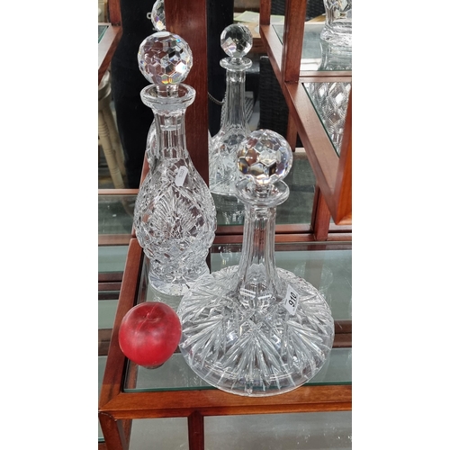 910 - Two elegant crystal decanters including one from Waterford Crystal in the Shannon Jubilee pattern, a... 