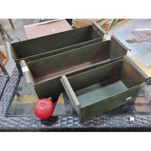 915 - Three vintage metal industrial trays with two larger and one smaller example. Featuring rounded pull... 