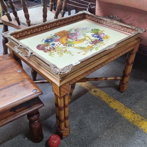 566 - Star lot : A fabulous very heavy coffee table tray with bamboo effect legs and frame, holding a larg... 