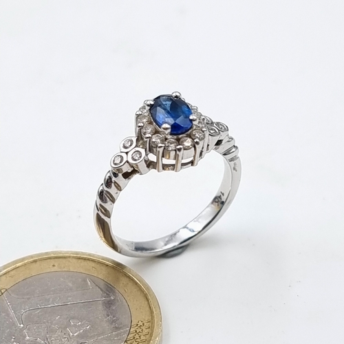 1 - Star Lot: An exquisite 14 carat White Gold Sapphire and Diamond ring, set beautifully with a central... 