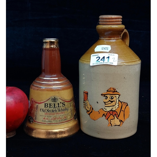 241 - Two stoneware bottles including a Bell's Old Scotch Whisky 6 2/3 fl oz with a sealed flagon and stop... 