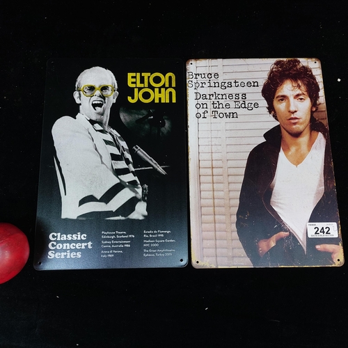 242 - Two metal signs advertising musicians Elton John and Bruce Springsteen. H30cm x W20cm