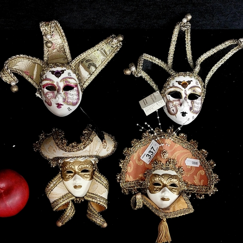 337 - Four beautiful Italian made neatly proportioned Venetian mask ornaments with striking headpieces fin... 