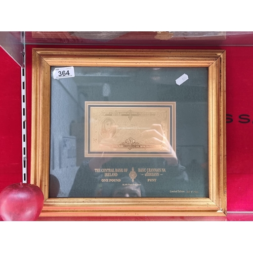 364 - A framed limited edition (349/7500) display of a gold (99.9% pure) Lady Lavery £1 bank note issued b... 