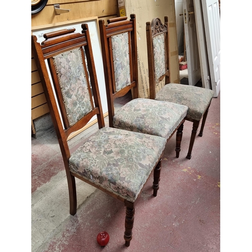 416 - Three vintage chairs including a pair of matching chairs with heavy wooden frame. Along with a third... 