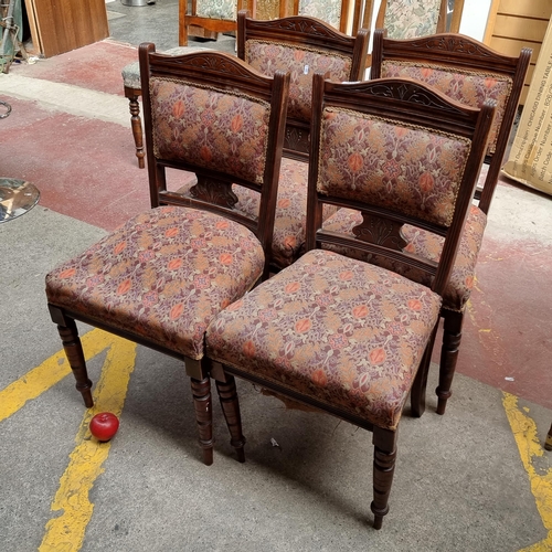 418 - Four beautiful mahogany dining chairs with carved detail and upholstered in a orange and purple fabr... 