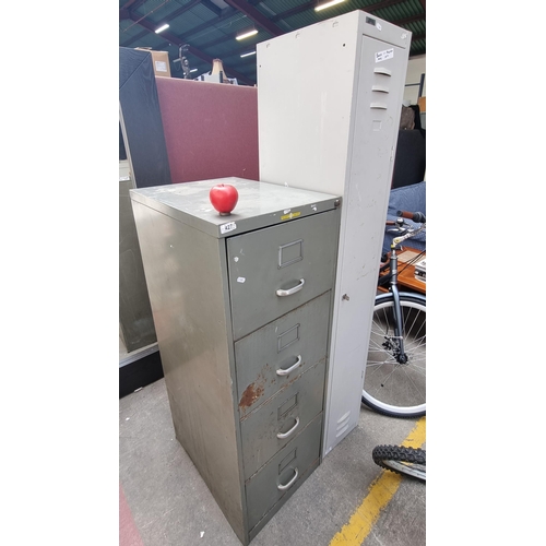 427 - Two commercial quality vintage filing cabinets including a large Triumph example and a second Hely's... 