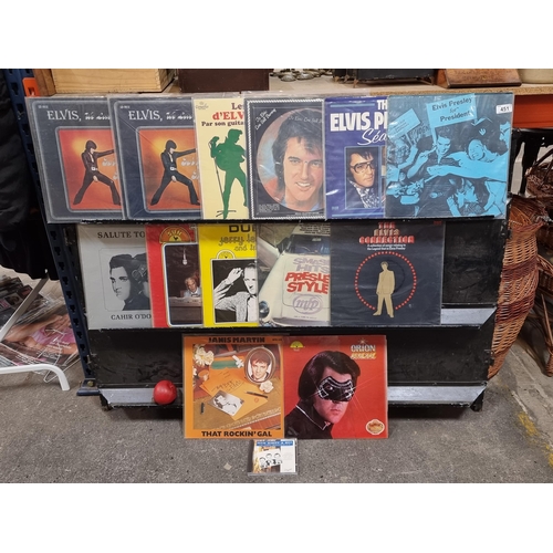 451 - A mixed selection of eleven vinyl albums featuring the songs of Elvis Presley. Consisting mostly of ... 