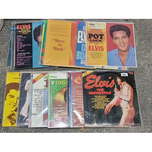 489 - A selection of twenty vinyl albums concerned with the songs and performances of Elvis Presley. Inclu... 