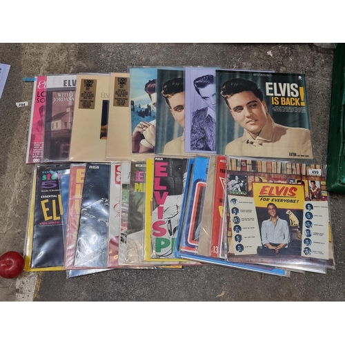 499 - A selection of twenty-nine vinyl albums concerned with the songs and performances of Elvis Presley. ... 