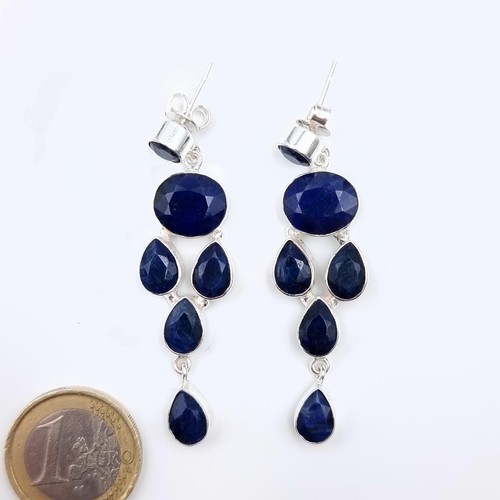 50 - A heavy and high quality Blue Sapphire graduated tear drop earrings, set in Sterling Silver. Fabulou... 