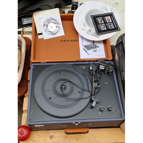 517 - A Crosley 'Keepsake' USB turntable, model number: CR6249A. Held in a stylish carry case and comes wi... 