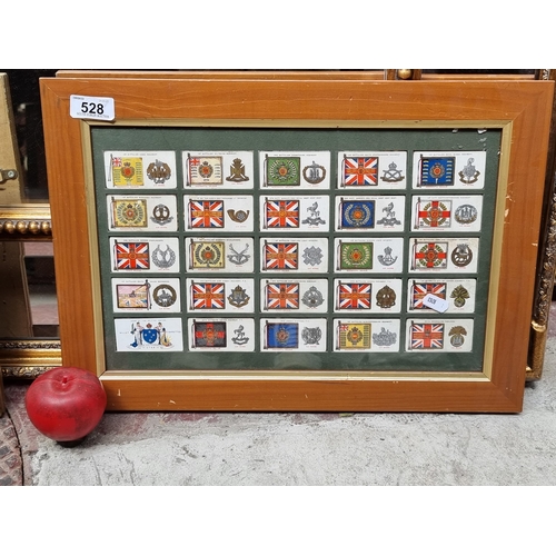 528 - A framed collection of 25 Player's & Sons cigarette cards from the series 