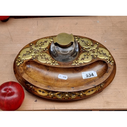 534 - A beautiful antique desk organiser with glass ink well and pen rest. Wonderfully decorated with bras... 