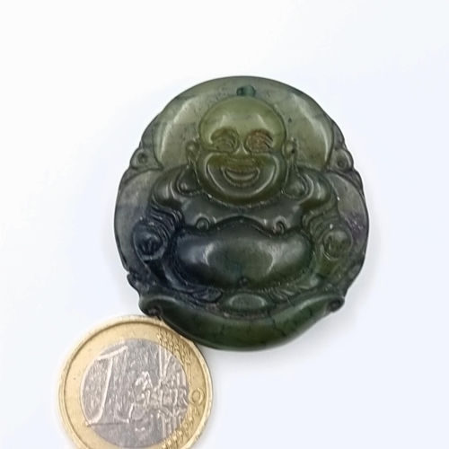 590 - A South East Asian hand carved Jade Laughing Buddha amulet. Length: 4cm x 3cm. Weight: 29.30 grams. ... 