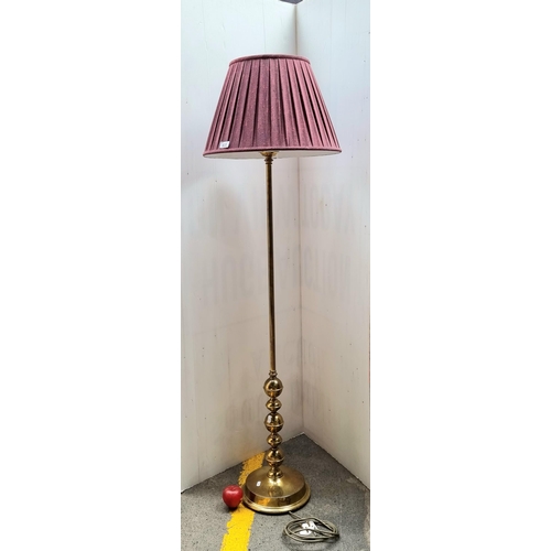 633 - A fabulous tall and very heavy vintage brass floor standing lamp topped with a pleated burgundy shad... 