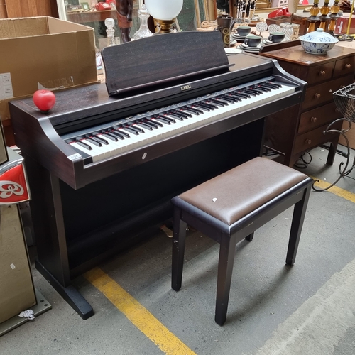 634 - Star lot : A Kawai digital piano model no. CN390 with full sized weighted keyboard, wooden frame, th... 