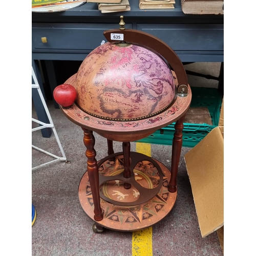 635 - Star lot : A fantastic drinks cabinet in the form of an antique globe. Opens to reveal storage insid... 