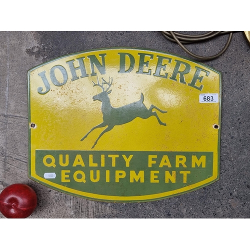 683 - Star Lot : A wonderful vintage heavy enameled metal sign advertising John Deere Quality Farm Equipme... 