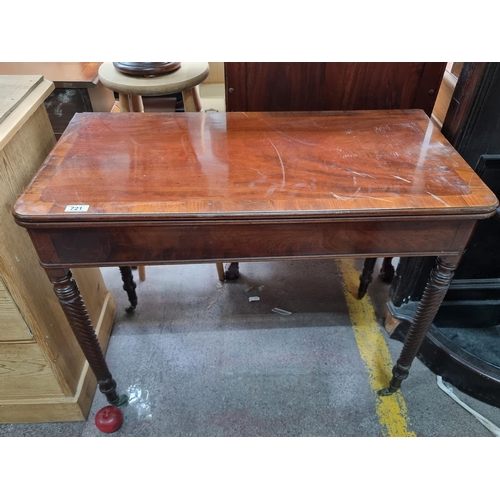 721 - A gorgeous antique fold out swivel top wooden table with beautiful barley twist legs, all held on or... 