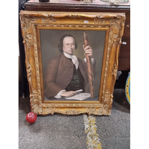 755 - A large print on textured fabric depicting a gentleman housed in a lavish vintage wooden frame featu... 