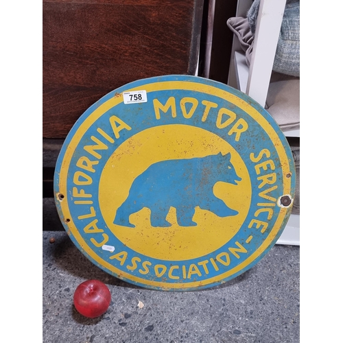 758 - A wonderful vintage heavy enameled circular advertising sign for the California Motor Service Associ... 