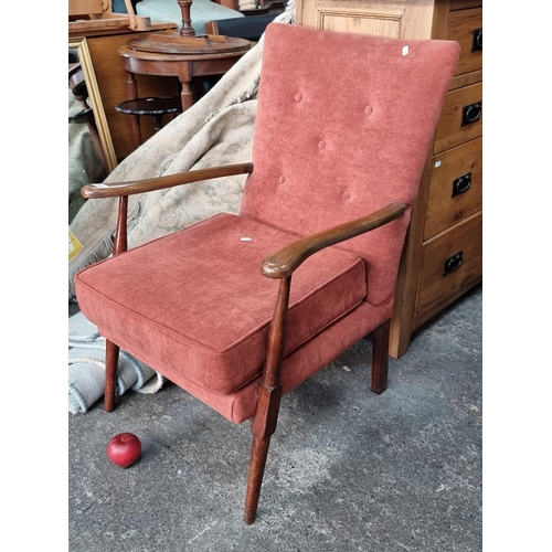 782 - A very stylish mid century modern accent chair. With fabulous outward curved arms, unusual carved le... 