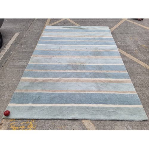 780 - A very large, very plush carpet in soothing shades of teal, aqua blue and cream. 
MM: 297 x 202 cm