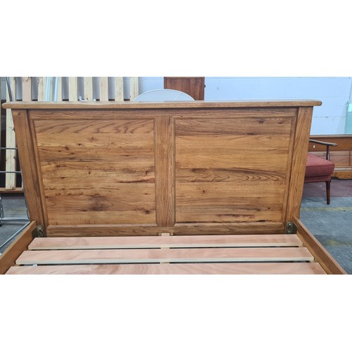 778 - Star Lot : A lovely solid oak queen size  Sleigh bed, with recessed paneling to headboard; a substan... 