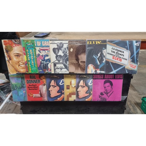 448 - A mixed selection of eleven vinyl albums featuring the songs of Elvis Presley. Consisting mostly of ... 