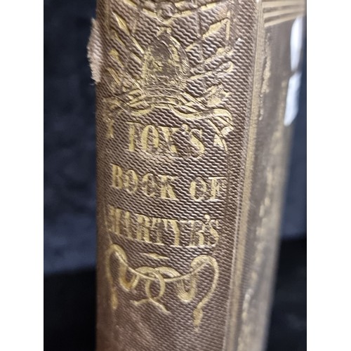 350 - An antique hardback book titled 'Fox's Book of Martyrs' by Rev. John Fox. Published by Auburn and Bu... 