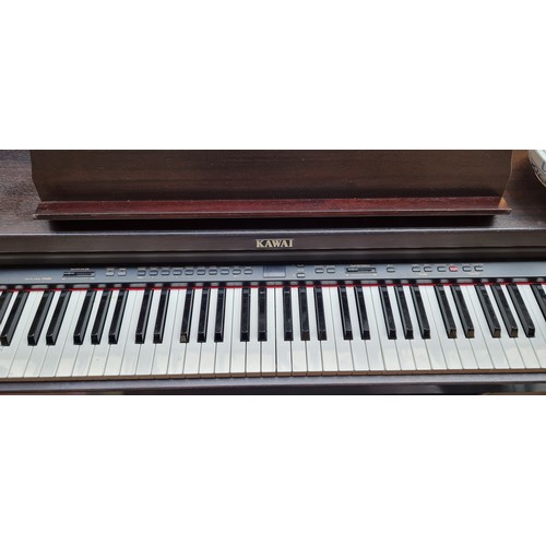 634 - Star lot : A Kawai digital piano model no. CN390 with full sized weighted keyboard, wooden frame, th... 