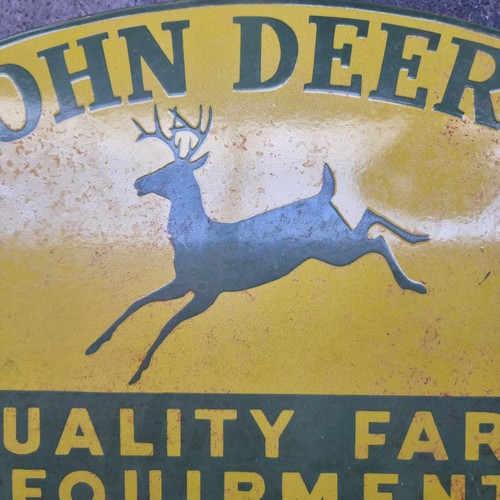 683 - Star Lot : A wonderful vintage heavy enameled metal sign advertising John Deere Quality Farm Equipme... 